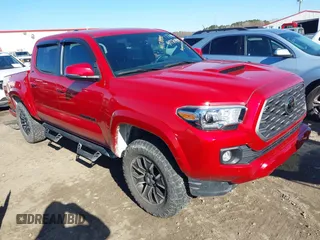 2023 Toyota Tacoma 4WD SR with VIN 3TMCZ5AN1PM613455, listed as a IAAI auction lot 41770990 with 12,643 mi miles. Bid and sale history available at carsss.com. Image 1.