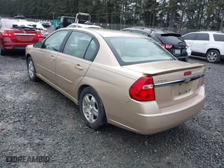 2004 Chevrolet Malibu LT with VIN 1G1ZU548X4F246722, listed as a IAAI auction lot 41846487 with 122,560 mi miles. Bid and sale history available at carsss.com. Image 3.