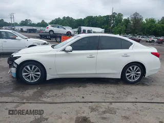 2014 Infiniti Q50 with VIN JN1BV7AP1EM670108, listed as a IAAI auction lot 42428330 with 260,478 mi miles and . Bid and sale history available at DreamBid. Image 14.