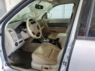 2012 Ford Escape Hybrid with VIN 1FMCU5K37CKB42310, listed as a Copart auction lot 67651144 with 154,852 mi miles and Salvage title. Bid and sale history available at DreamBid. Image 7.