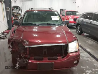 2005 GMC Envoy SLT with VIN 1GKDT13S752214687, listed as a IAAI auction lot 41421248 with 145,388 mi miles. Bid and sale history available at carsss.com. Image 13.