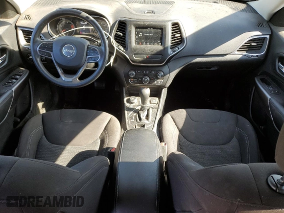 2019 Jeep Cherokee Latitude with VIN 1C4PJMCB0KD124765, listed as a Copart auction lot 59771225 with 147,815 mi miles and Salvage title. Bid and sale history available at DreamBid. Image 8.