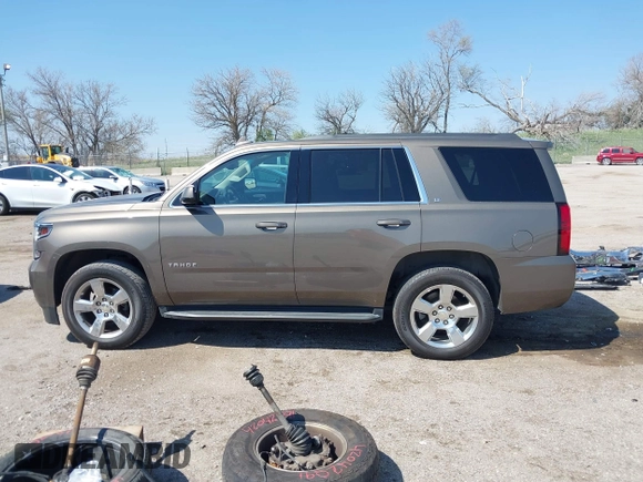 2016 Chevrolet Tahoe LT with VIN 1GNSKBKC9GR434579, listed as a IAAI auction lot 42080094 with 137,910 mi miles and . Bid and sale history available at DreamBid. Image 15.