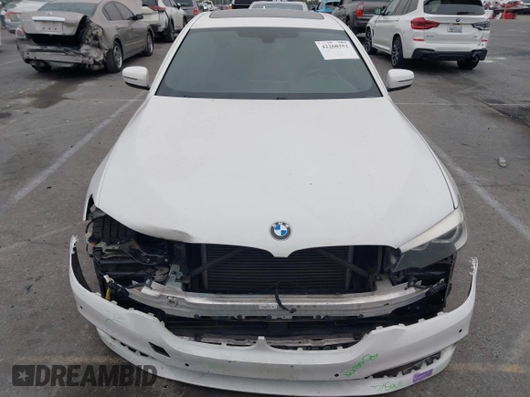 2018 BMW 5 Series 530e with VIN WBAJA9C56JB252738, listed as a IAAI auction lot 42260352 with 113,581 mi miles and . Bid and sale history available at DreamBid. Image 13.