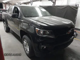 2021 Chevrolet Colorado 2WD LT z VIN 1GCGSCEN2M1195243, wystawiony jako IAAI lot #42328076 z przebiegiem 50 211 mil mil oraz . Historia ofert i sprzedaży dostępna na DreamBid. Obrazek 1.