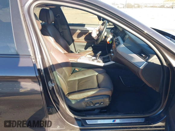 2014 BMW 5 Series 535i with VIN WBA5B1C5XED474998, listed as a IAAI auction lot 41324441 with 131,977 mi miles and . Bid and sale history available at DreamBid. Image 5.