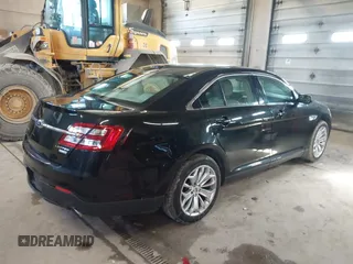 2015 Ford Taurus Limited with VIN 1FAHP2J87FG172580, listed as a IAAI auction lot 41891567 with 183,784 mi miles. Bid and sale history available at carsss.com. Image 4.