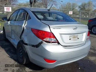 2013 Hyundai Accent GLS with VIN KMHCT4AE4DU477465, listed as a IAAI auction lot 41930256 with 48,877 mi miles and . Bid and sale history available at carsss.com. Image 3.