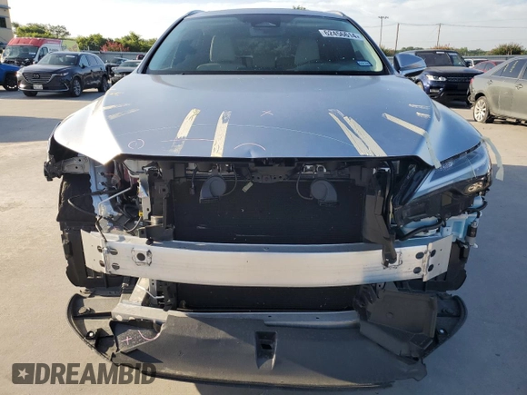2024 Lexus RX with VIN JTJCHMAA0R2017786, listed as a Copart auction lot 62456614 with 4,147 mi miles and Salvage Title. Bid and sale history available at carsss.com. Image 5.