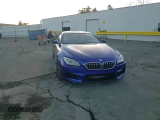 2014 BMW M6 z VIN WBS6C9C5XEDV73722, wystawiony jako Copart lot #87202664 z przebiegiem 68 283 mil mil oraz Szkoda całkowita • Salvage title. Historia ofert i sprzedaży dostępna na DreamBid. Obrazek 10.