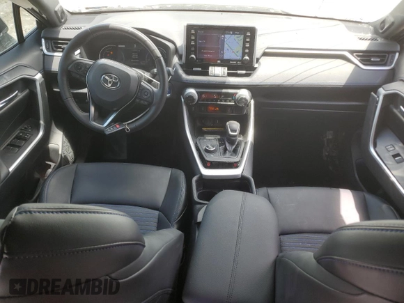 2021 Toyota RAV4 Hybrid XSE with VIN 4T3E6RFV3MU061808, listed as a Copart auction lot 57048025 with 20,614 mi miles and Salvage title. Bid and sale history available at DreamBid. Image 8.
