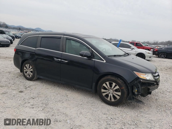 2014 Honda Odyssey EX-L with VIN 5FNRL5H65EB061079, listed as a Copart auction lot 48259855 with 126,498 mi miles and Salvage Title. Bid and sale history available at DreamBid. Image 4.