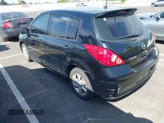 2009 Nissan Versa 1.8 SL with VIN 3N1BC13E99L409145, listed as a IAAI auction lot 42151530 with 150,930 mi miles. Bid and sale history available at carsss.com. Image 3.