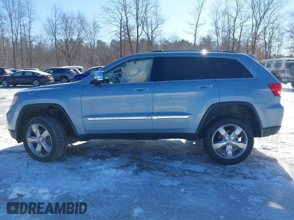 2013 Jeep Grand Cherokee Overland with VIN 1C4RJFCTXDC541770, listed as a IAAI auction lot 41610600 with 164,065 mi miles. Bid and sale history available at carsss.com. Image 14.