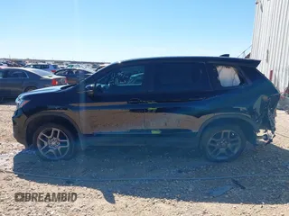 2023 Honda Passport EX-L z VIN 5FNYF8H5XPB013172, wystawiony jako IAAI lot #41680601 z przebiegiem 29 016 mil mil oraz . Historia ofert i sprzedaży dostępna na DreamBid. Obrazek 15.