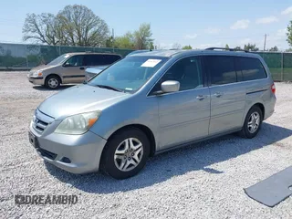 2007 Honda Odyssey EX with VIN 5FNRL38457B042912, listed as a IAAI auction lot 41992847 with 194,822 mi miles and . Bid and sale history available at DreamBid. Image 17.