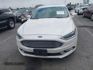 2017 Ford Fusion SE with VIN 3FA6P0HD0HR180188, listed as a IAAI auction lot 42146020 with 100,901 mi miles and . Bid and sale history available at DreamBid. Image 12.