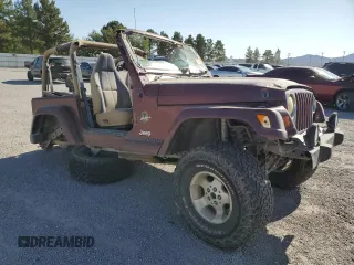 2002 Jeep Wrangler Sahara with VIN 1J4FA59S72P706380, listed as a Copart auction lot 56365355 with 282,467 mi miles and Clean title. Bid and sale history available at DreamBid. Image 4.
