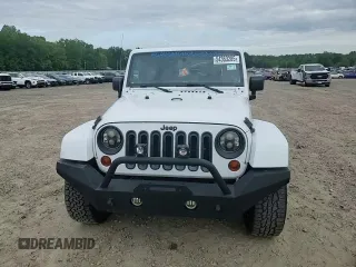 2012 Jeep Wrangler Unlimited Sahara with VIN 1C4HJWEG8CL126053, listed as a Copart auction lot 54363285 with 88,014 mi miles and Salvage title. Bid and sale history available at DreamBid. Image 13.