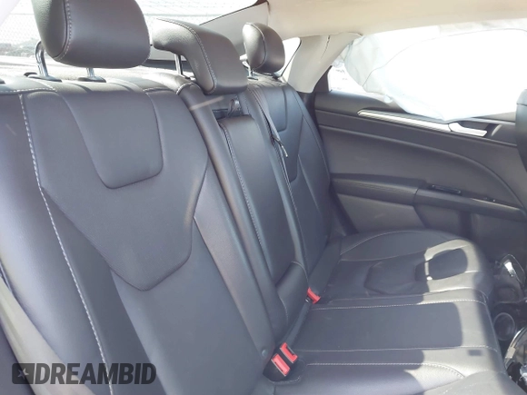 2016 Ford Fusion Titanium with VIN 3FA6P0K9XGR250007, listed as a IAAI auction lot 41775696 with 90,000 mi miles and . Bid and sale history available at DreamBid. Image 8.