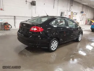 2012 Ford Fiesta S with VIN 3FADP4AJ8CM105033, listed as a IAAI auction lot 41452166 with 69,553 mi miles. Bid and sale history available at carsss.com. Image 4.