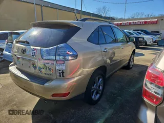 2008 Lexus RX 400h with VIN JTJGW31U082006748, listed as a Copart auction lot 86556234 with 241,549 mi miles and Clean Title. Bid and sale history available at DreamBid. Image 4.