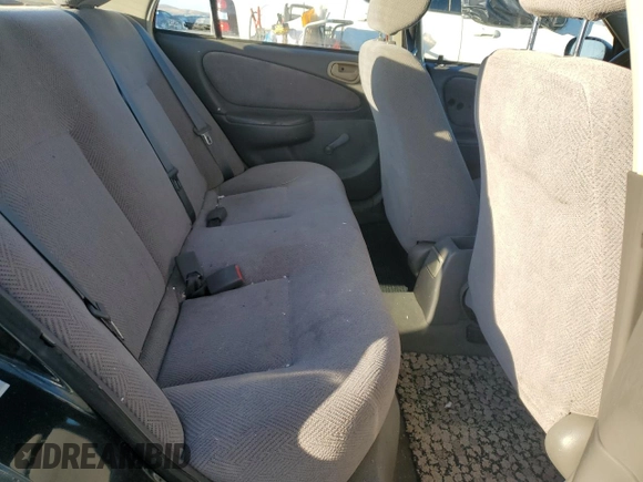 1999 Chevrolet Prizm z VIN 1Y1SK5289XZ411868, wystawiony jako Copart lot #79348064 z przebiegiem 175 202 mil mil oraz Czysty tytuł • Clean title. Historia ofert i sprzedaży dostępna na DreamBid. Obrazek 10.