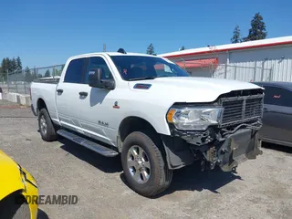 2024 Ram 2500 Lone Star with VIN 3C6UR5DL9RG303433, listed as a IAAI auction lot 42046073 with 32,264 mi miles. Bid and sale history available at carsss.com. Image 1.