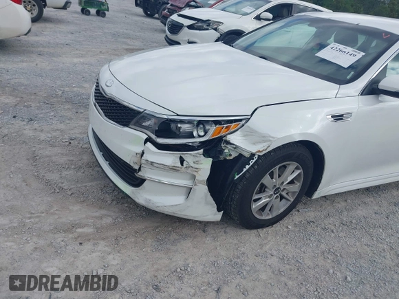 2017 Kia Optima LX z VIN 5XXGT4L32HG161091, wystawiony jako IAAI lot #42266149 z przebiegiem 166 254 mil mil oraz . Historia ofert i sprzedaży dostępna na DreamBid. Obrazek 6.