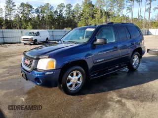 2004 GMC Envoy SLE with VIN 1GKDS13S742231880, listed as a Copart auction lot 88143635 with 205,953 mi miles and Salvage Title. Bid and sale history available at carsss.com. Image 1.