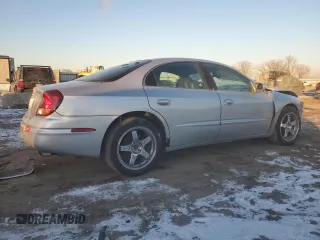 2003 Oldsmobile Aurora z VIN 1G3GS64C034150414, wystawiony jako Copart lot #88490635 z przebiegiem 119 061 mil mil oraz Szkody całkowita. Historia ofert i sprzedaży dostępna na DreamBid. Obrazek 3.