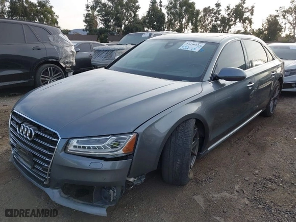 2016 Audi A8 L 4.0T Sport with VIN WAU43AFD1GN008031, listed as a IAAI auction lot 41390435 with 153,152 mi miles. Bid and sale history available at carsss.com. Image 2.