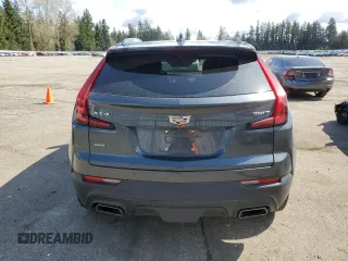 2021 Cadillac XT4 AWD Luxury with VIN 1GYFZBR48MF034573, listed as a Copart auction lot 51114315 with 53,066 mi miles and Salvage title. Bid and sale history available at DreamBid. Image 6.