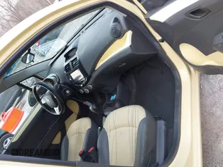 2014 Chevrolet Spark LT with VIN KL8CD6S99EC431211, listed as a IAAI auction lot 41901679 with 136,463 mi miles. Bid and sale history available at carsss.com. Image 5.