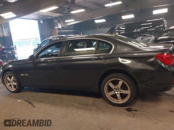 2011 BMW 7 Series 750Li xDrive with VIN WBAKC8C56BC433083, listed as a IAAI auction lot 42523890 with 120,977 mi miles and . Bid and sale history available at DreamBid. Image 15.