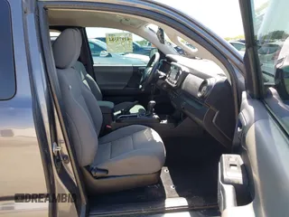 2020 Toyota Tacoma SR with VIN 3TYRX5GNXLT002488, listed as a IAAI auction lot 41973584 with 76,169 mi miles and . Bid and sale history available at DreamBid. Image 5.