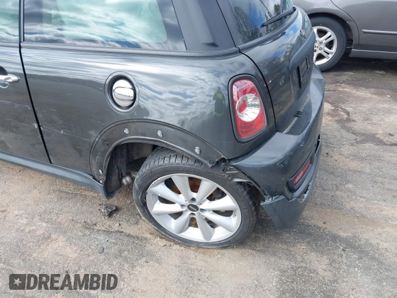 2013 MINI Hardtop S with VIN WMWSV3C50DT394345, listed as a IAAI auction lot 41738216 with 58,241 mi miles and . Bid and sale history available at DreamBid. Image 14.