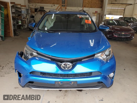 2018 Toyota RAV4 XLE with VIN JTMRFREV2JD234746, listed as a Copart auction lot 52576205 with 0 mi miles and Salvage Title. Bid and sale history available at carsss.com. Image 5.