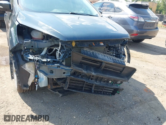 2019 Ford Escape Titanium with VIN 1FMCU9J99KUC00935, listed as a IAAI auction lot 42583250 with 91,241 mi miles and . Bid and sale history available at DreamBid. Image 18.