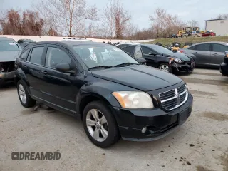 2010 Dodge Caliber Mainstreet z VIN 1B3CB3HAXAD551716, wystawiony jako Copart lot #77349503 z przebiegiem 144 209 mil mil oraz Tytuł czysty. Historia ofert i sprzedaży dostępna na DreamBid. Obrazek 4.