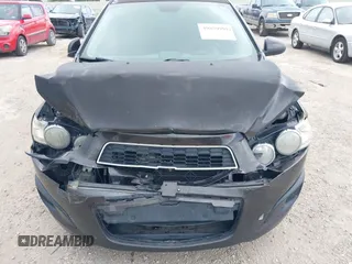 2013 Chevrolet Sonic LT with VIN 1G1JC5SH7D4236146, listed as a IAAI auction lot 39859991 with 135,006 mi miles and . Bid and sale history available at DreamBid. Image 6.