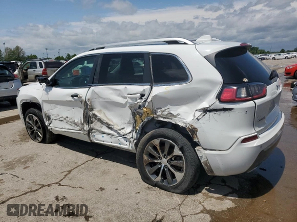 2019 Jeep Cherokee Overland with VIN 1C4PJMJN3KD123879, listed as a Copart auction lot 57650905 with 77,962 mi miles and Salvage title. Bid and sale history available at DreamBid. Image 2.
