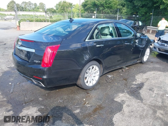 2014 Cadillac CTS RWD with VIN 1G6AP5SX9E0134183, listed as a IAAI auction lot 42190674 with 59,603 mi miles and . Bid and sale history available at DreamBid. Image 4.