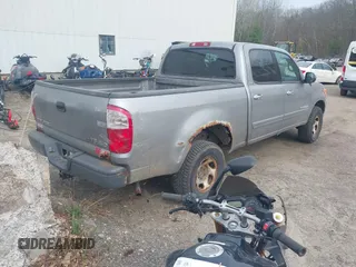 2004 Toyota Tundra SR5 with VIN 5TBDT441X4S442511, listed as a IAAI auction lot 42160328 with 157,997 mi miles and . Bid and sale history available at DreamBid. Image 4.