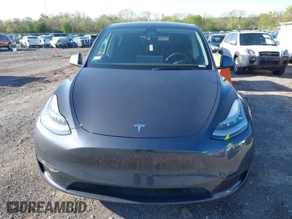 2021 Tesla Model Y Long Range with VIN 5YJYGAEE1MF149887, listed as a IAAI auction lot 42032104 with 54,932 mi miles. Bid and sale history available at carsss.com. Image 12.