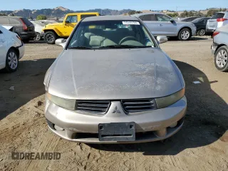 2002 Mitsubishi Galant ES z VIN 4A3AA46G12E123287, wystawiony jako Copart lot #74540784 z przebiegiem 259 181 mil mil oraz Szkoda całkowita • Salvage title. Historia ofert i sprzedaży dostępna na DreamBid. Obrazek 5.