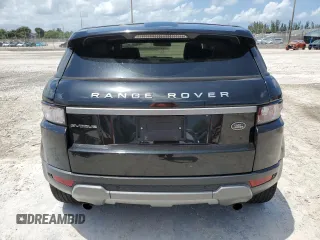 2014 Land Rover Range Rover Evoque Pure Premium z VIN SALVR2BG1EH896666, wystawiony jako Copart lot #58449085 z przebiegiem Nie podano mil oraz Szkoda całkowita • Salvage title. Historia ofert i sprzedaży dostępna na DreamBid. Obrazek 6.