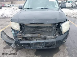2008 Ford Escape Hybrid with VIN 1FMCU59H28KB66264, listed as a IAAI auction lot 41656399 with 259,238 mi miles. Bid and sale history available at carsss.com. Image 6.