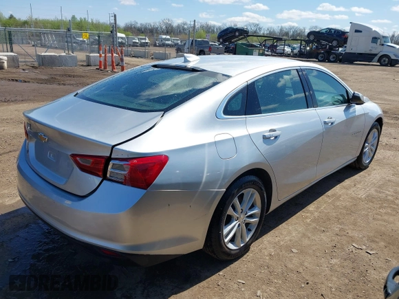 2018 Chevrolet Malibu LT with VIN 1G1ZD5ST8JF140336, listed as a IAAI auction lot 41972587 with 318,514 mi miles and . Bid and sale history available at DreamBid. Image 4.