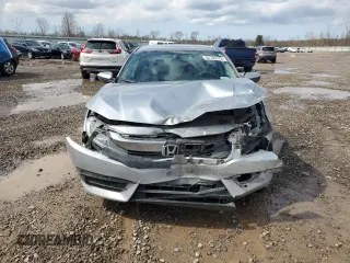 2017 Honda Civic Sedan LX with VIN 19XFC2F51HE218631, listed as a Copart auction lot 52105775 with 82,214 mi miles and Salvage Title. Bid and sale history available at carsss.com. Image 5.